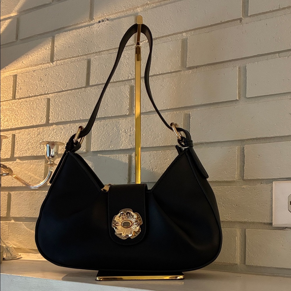 Sophisticated Black Shoulder Bag with Floral Accent
